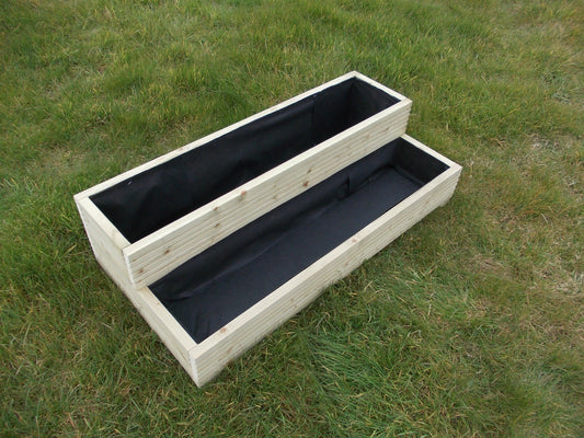 Wide step decking garden planter.